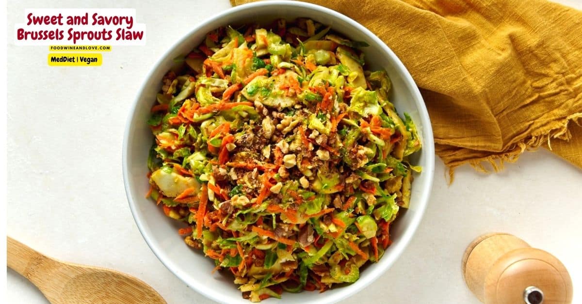 Sweet and Savory Brussels Sprouts Slaw, a simple and delicious vegan recipe made with carrots and apples tossed in a homemade vinaigrette.