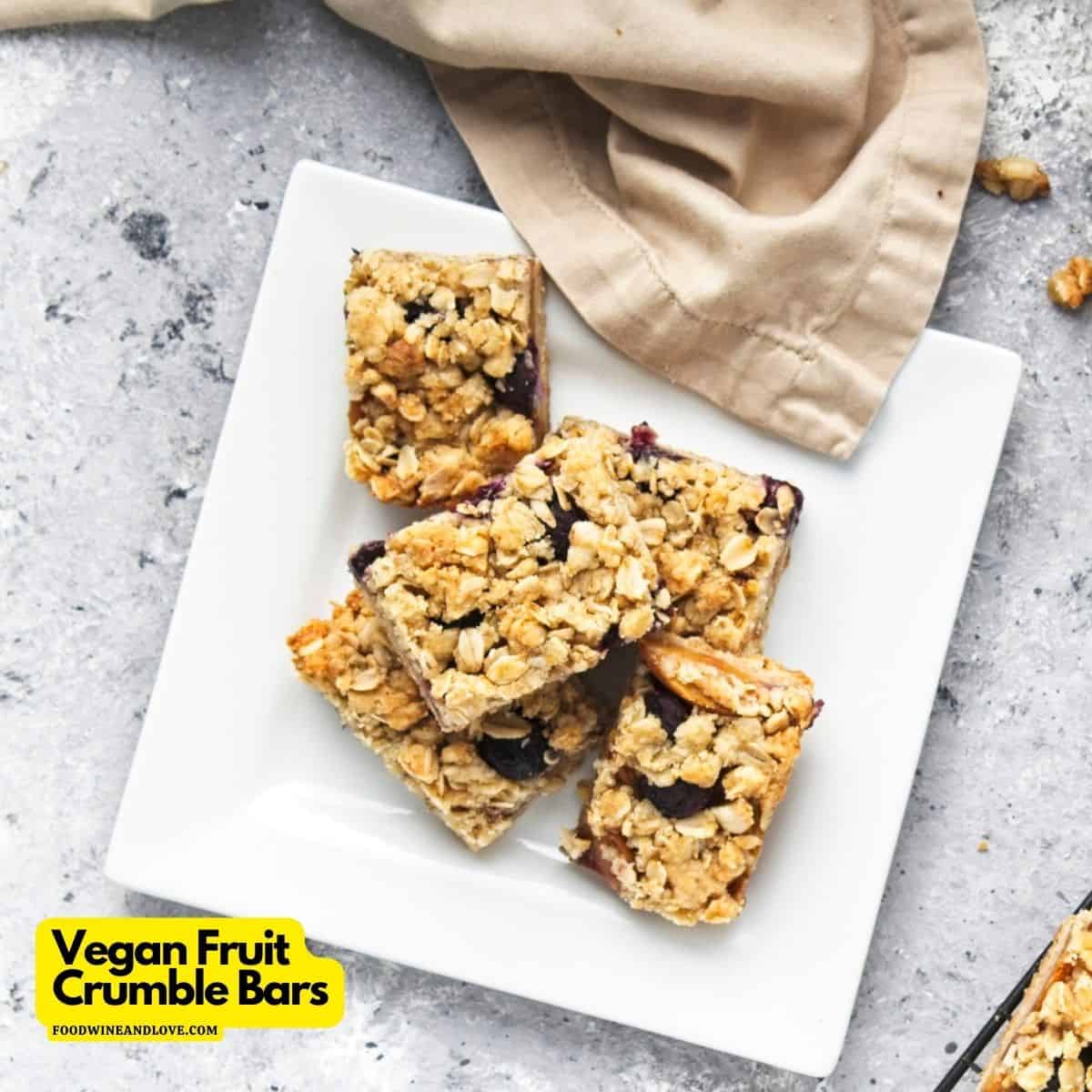 Vegan Fruit Crumble Bars are a simple layered dessert or snack recipe made with healthy ingredients including blueberries and oats.