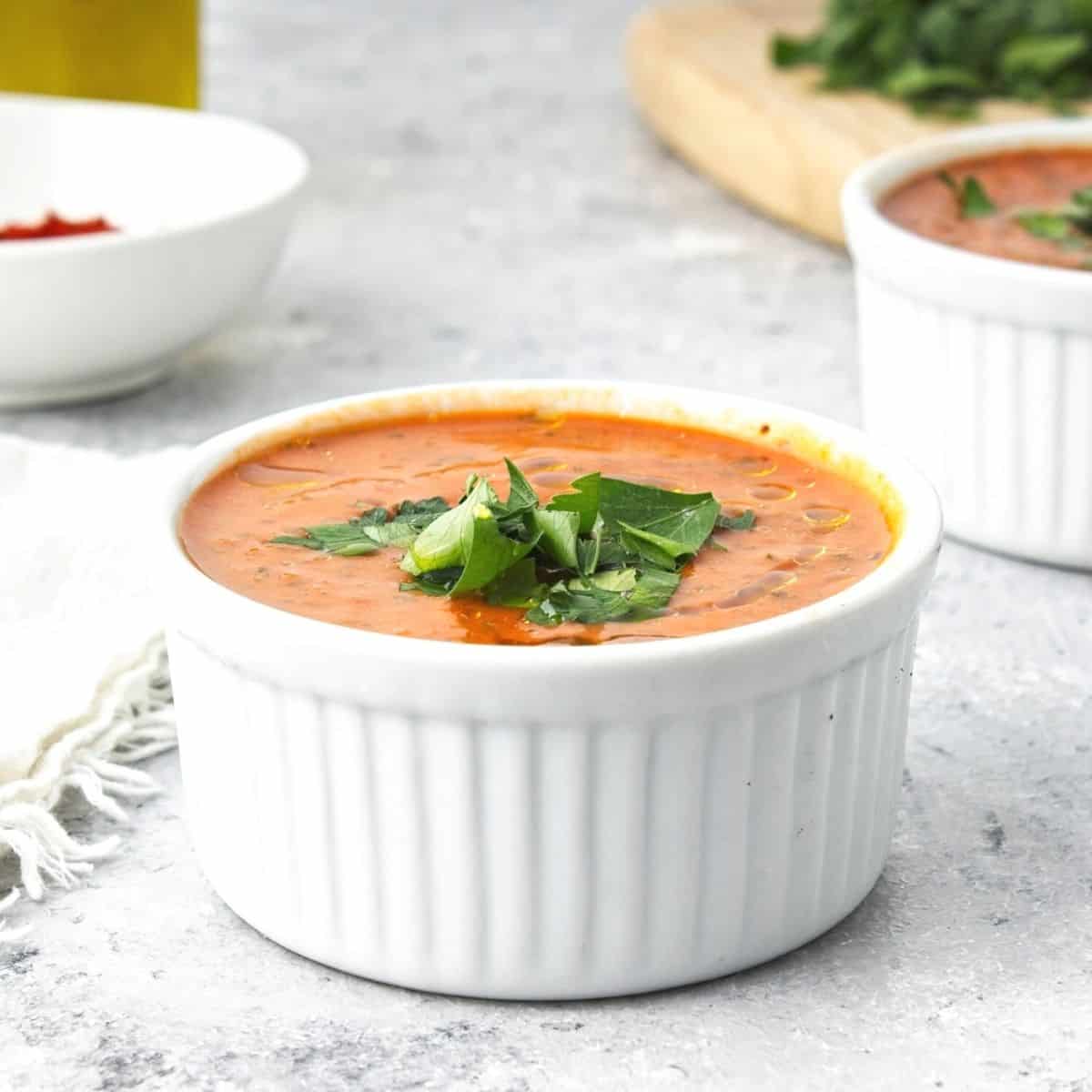 Roasted Red Pepper Gazpacho, a simple and delicious cold soup recipe made with fresh ingredients in a blender. Vegan, Mediterranean diet