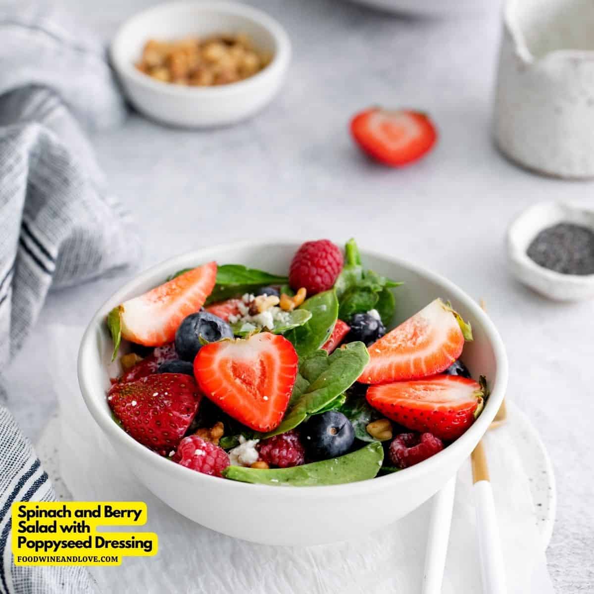 Spinach and Berry Salad with Poppy Seed Dressing, a delicious recipe made with fresh ingredients and topped with creamy honey dijon dressing.