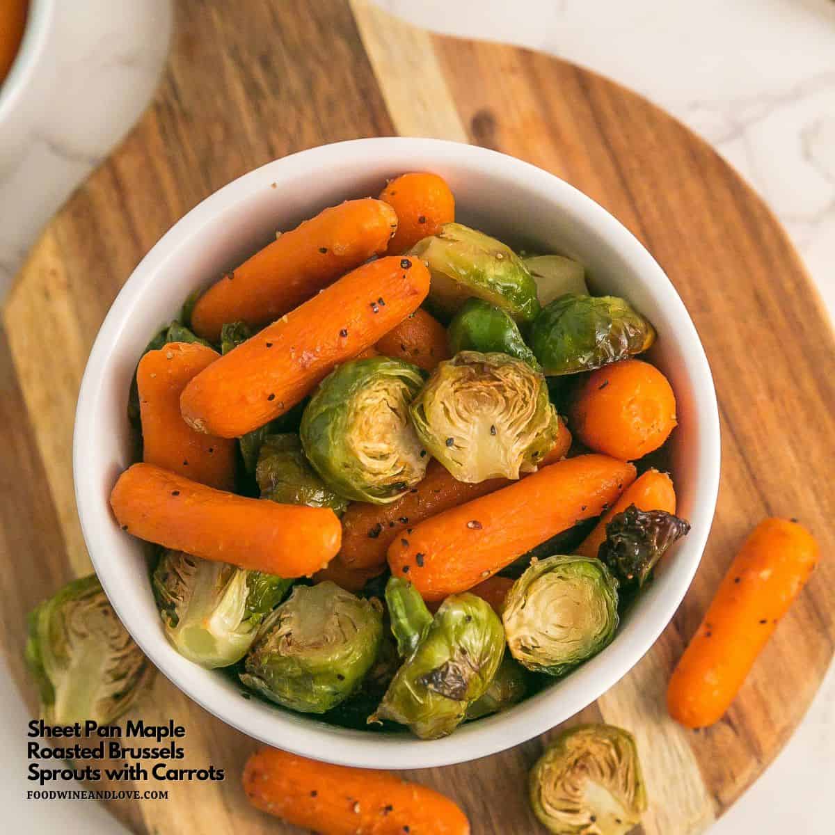 Sheet Pan Maple Roasted Carrots and Sprouts, a simple and delicious healthy side dish made with fresh brussel sprouts and baby carrots.
