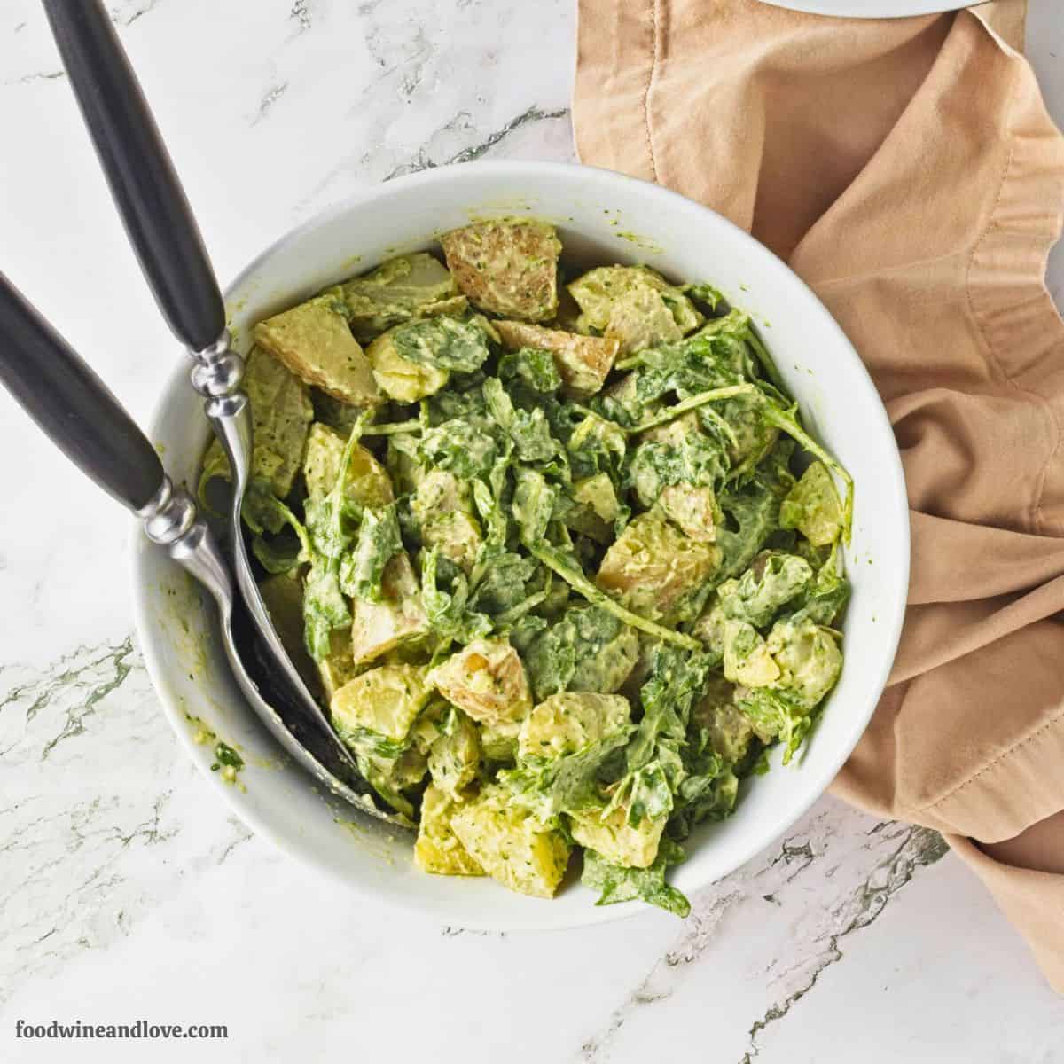 Potato Salad in Tahini Dressing, a simple and delicious recipe made with arugula and cilantro tossed in a creamy and savory dressing.
