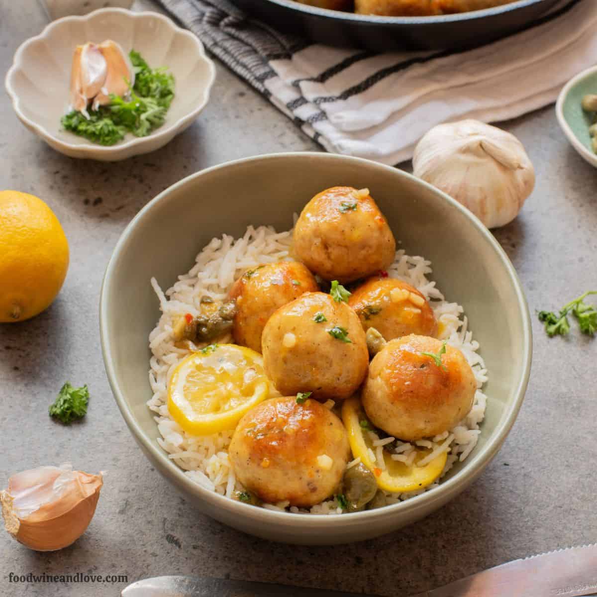 Chicken Piccata Meatballs, a simple recipe for Juicy chicken meatballs simmered in a bright lemon-butter caper sauce. Mediterranean diet. Chicken Piccata Meatballs, a simple recipe for Juicy chicken meatballs simmered in a bright lemon-butter caper sauce. Mediterranean diet.
