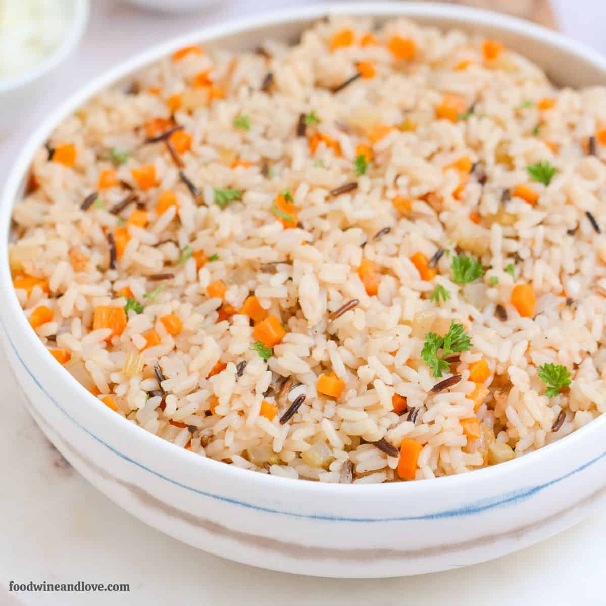 Rice Pilaf Recipe Made with Wild Rice Recipe, a blend of earthy wild rice and savory broth in a fluffy, flavorful healthy, gluten-free side. Rice Pilaf Recipe Made with Wild Rice is a blend of earthy wild rice with savory broth in a fluffy, flavorful healthy, gluten-free side.