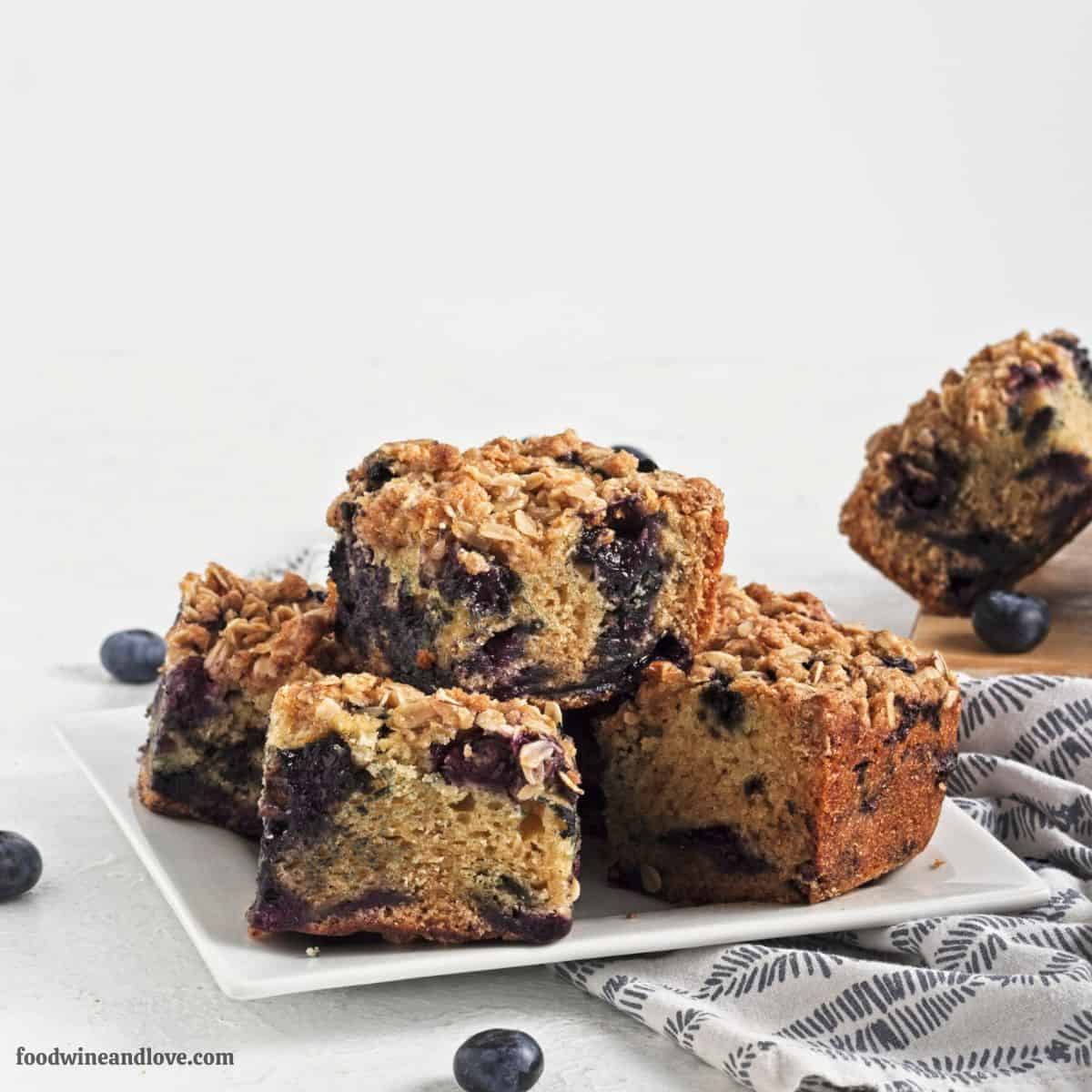 Dairy Free Blueberry Coffee Cake, a vegan dessert recipe featuring a tender and fluffy cake with a simple crumble topping. Dairy Free Blueberry Coffee Cake, a vegan dessert recipe featuring a tender and fluffy cake with a simple crumble topping.