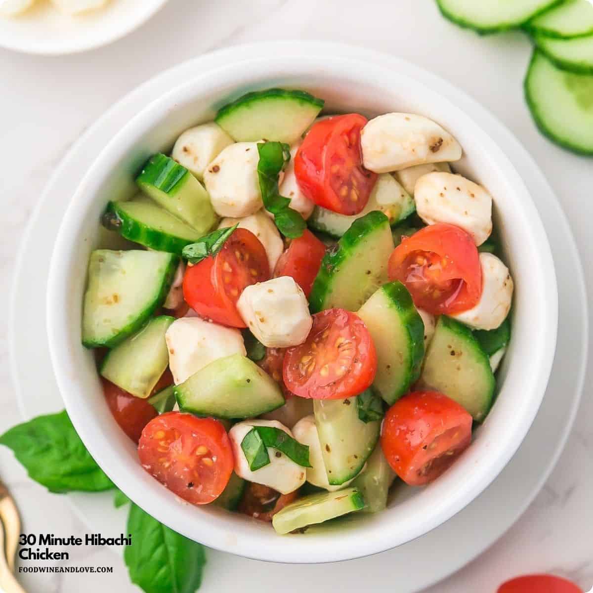 Zesty Cucumber Caprese Salad made with juicy tomatoes, mozzarella pearls, and fresh basil tossed in tangy vinaigrette. Quick, easy and perfect Zesty Cucumber Caprese Salad made with juicy tomatoes, mozzarella pearls, and fresh basil tossed in tangy vinaigrette. Quick, easy and perfect