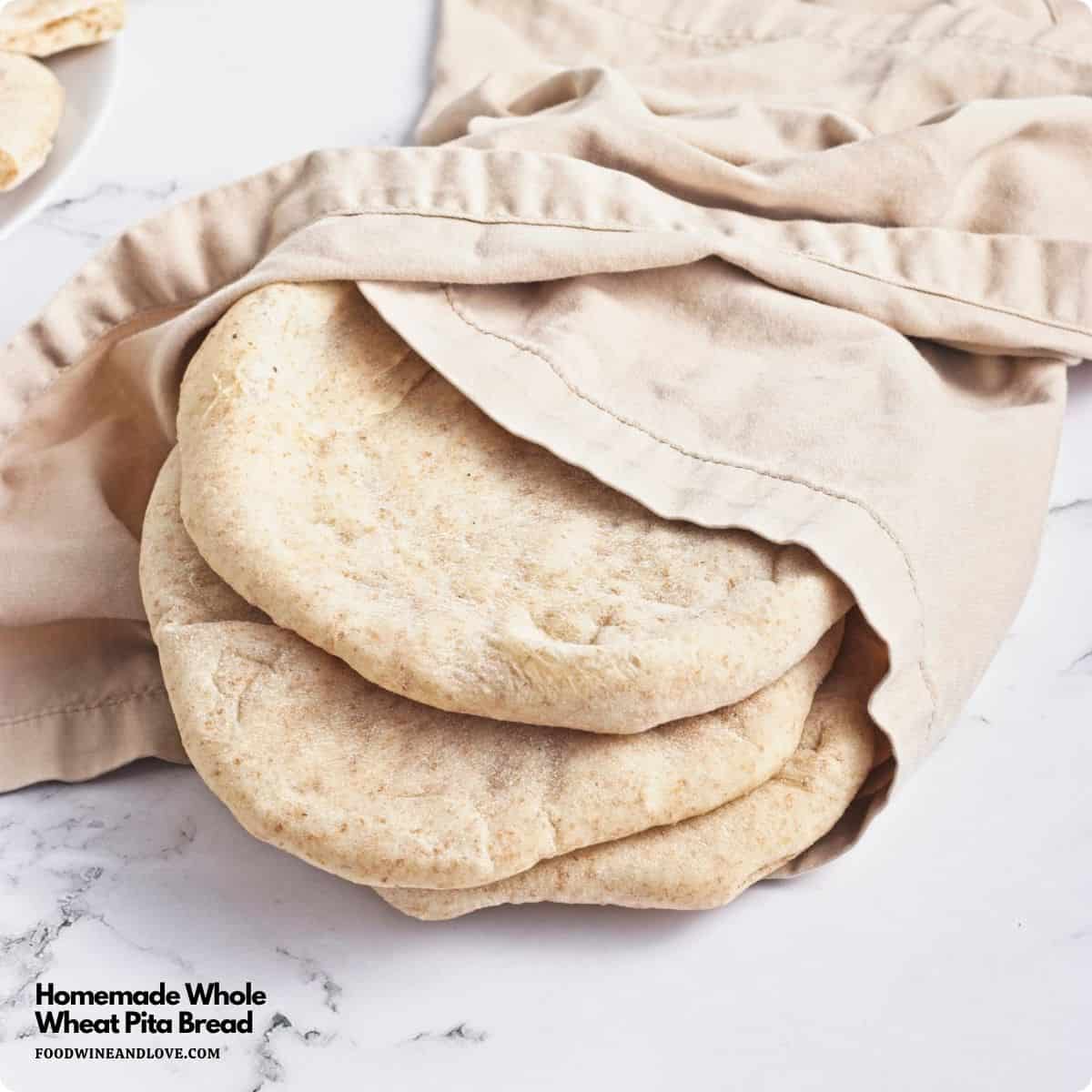 Homemade Whole Wheat Pita Bread, an easy recipe for fluffy and soft pita made with simple pantry ingredients. Vegan Recipe. Homemade Whole Wheat Pita Bread, an easy recipe for fluffy and soft pita made with simple pantry ingredients. Vegan Recipe.