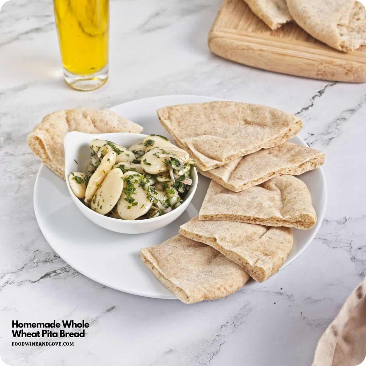 Homemade Whole Wheat Pita Bread, an easy recipe for fluffy and soft pita made with simple pantry ingredients. Vegan Recipe. Homemade Whole Wheat Pita Bread